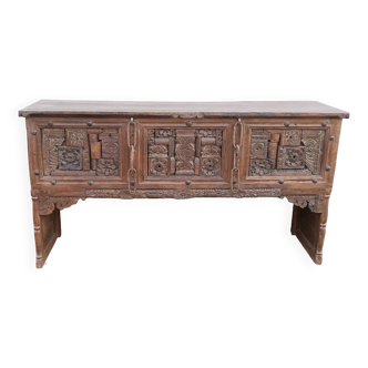 Old wooden console with chains