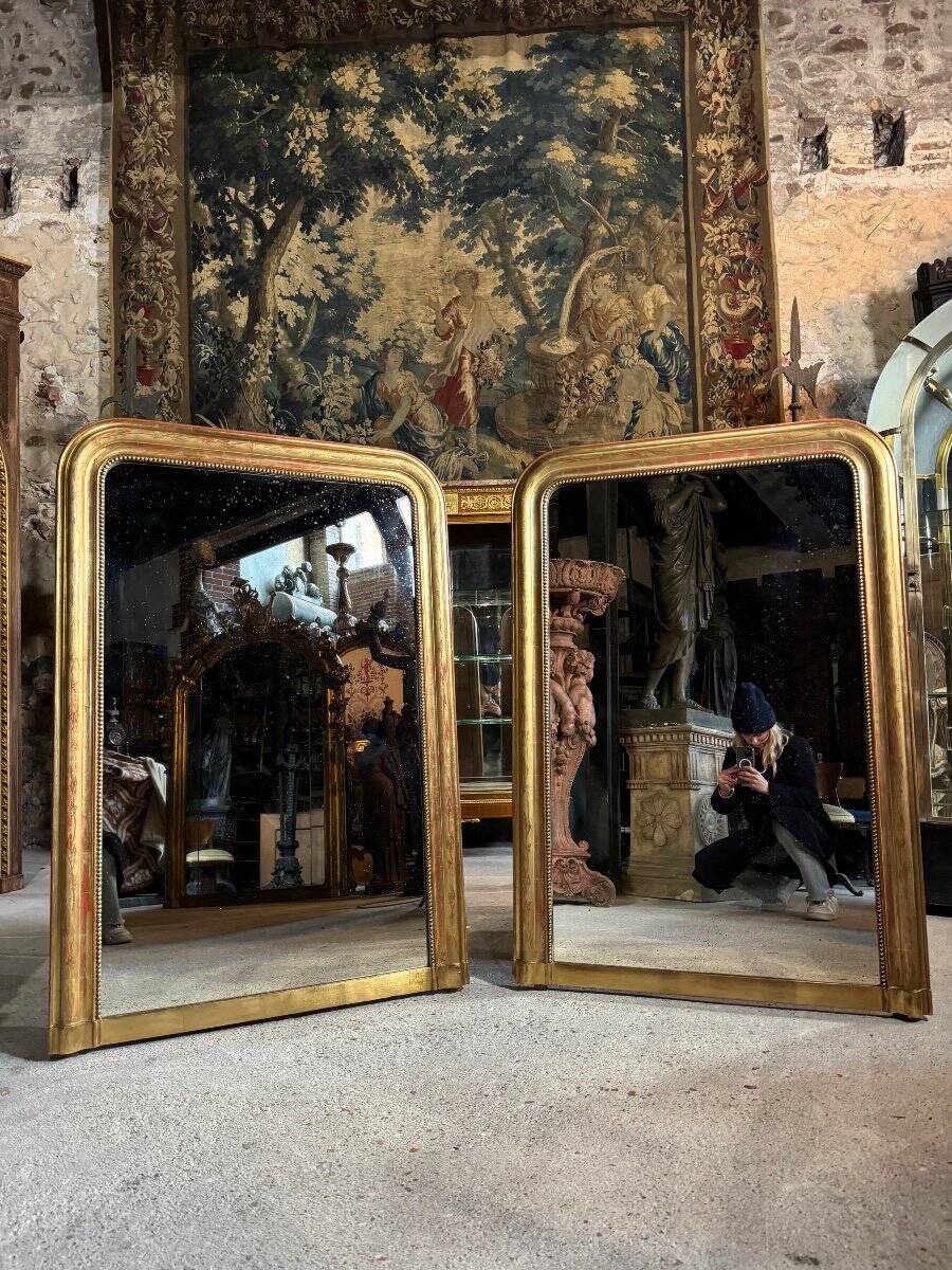 Pair of Louis Philippe period mirrors in gilded wood 1.30m x 89cm
