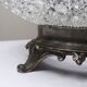 Pressed glass coupe with diamond points, antique from 1920-1950 on a pewter base.