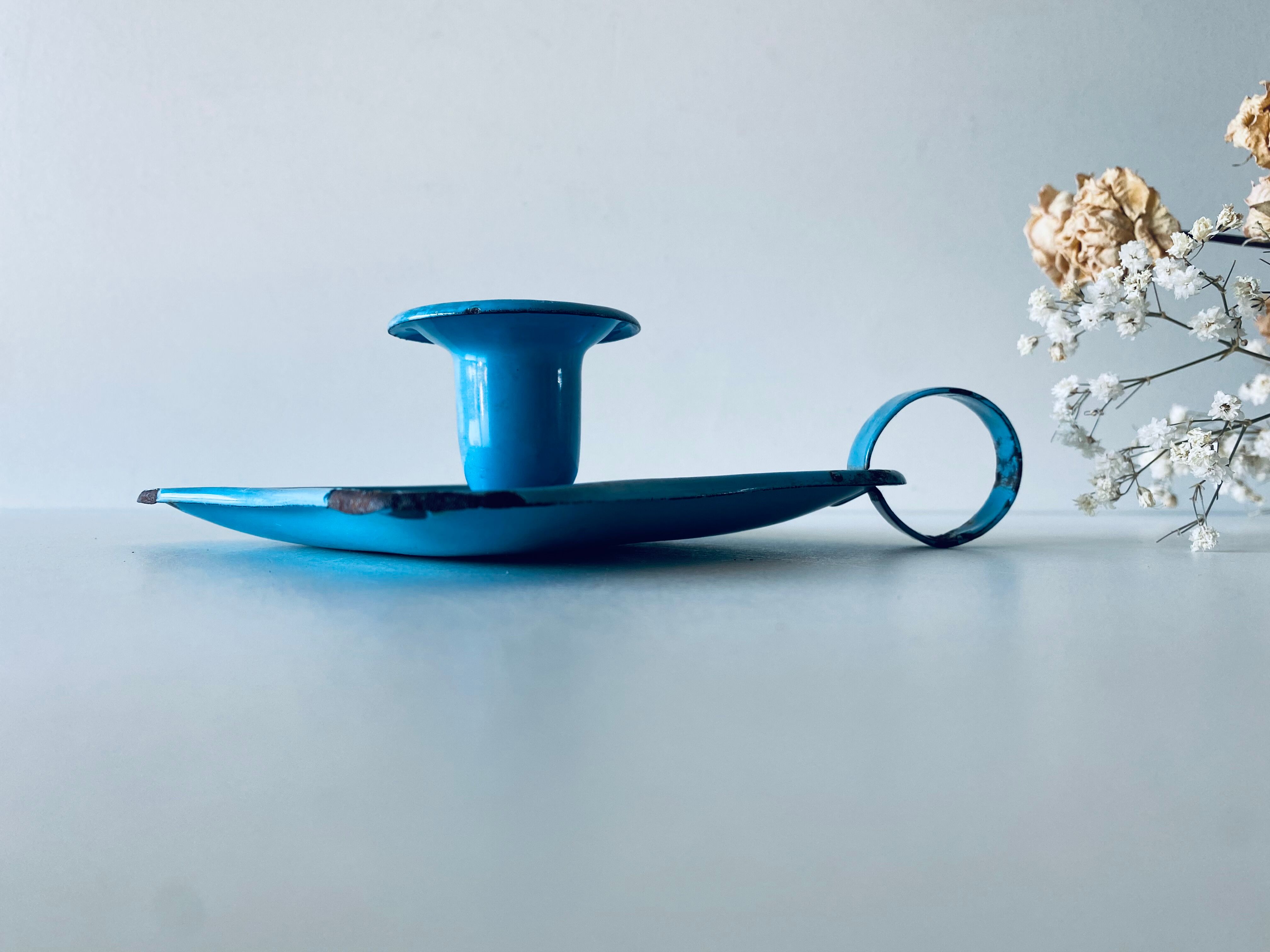 Old sky blue enamelled candle holder
