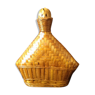 Vintage wicker and braided bamboo bottle