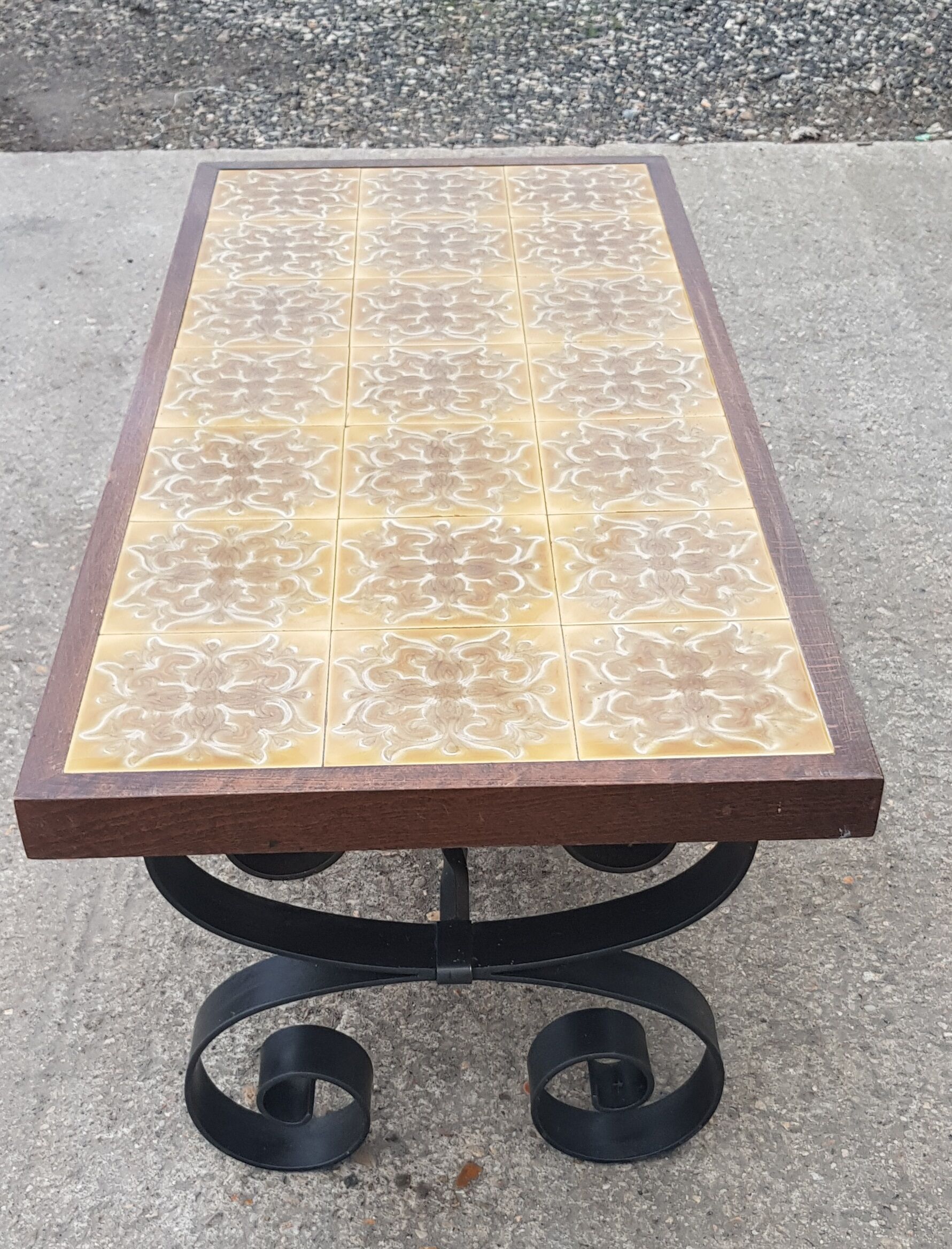 Antique vintage coffee table with glazed earthenware top