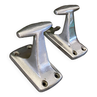 Pair of cast aluminum coat hooks