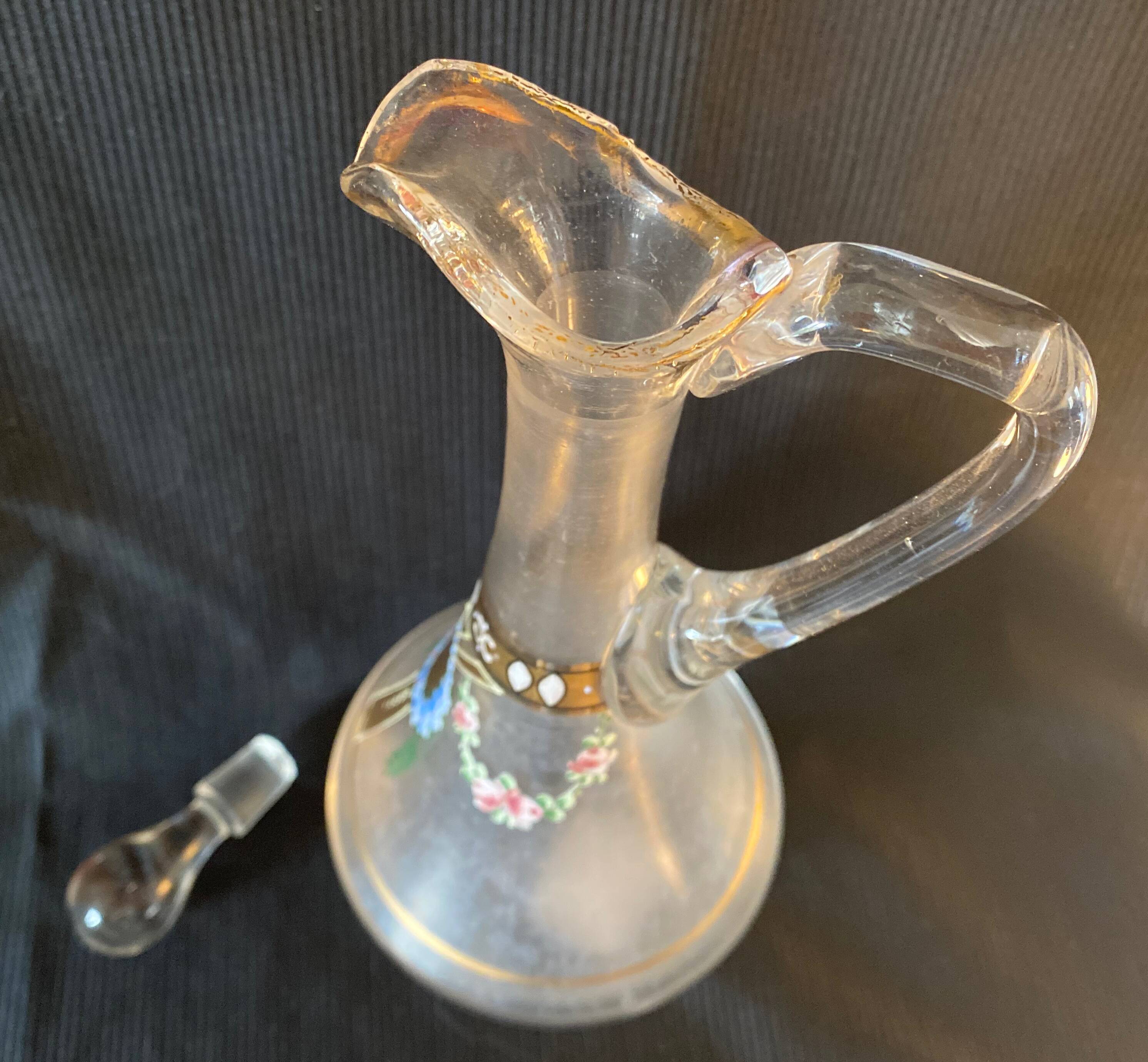 Small glass decanter decorations of enamel flower garland late nineteenth early twentieth