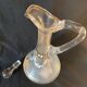 Small glass decanter decorations of enamel flower garland late nineteenth early twentieth