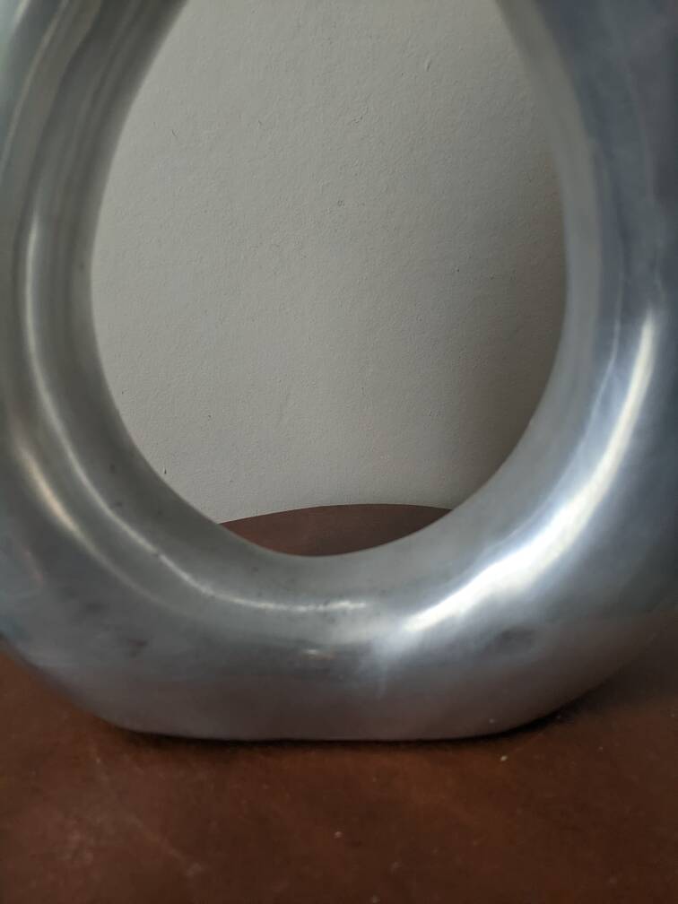 Contemporary design vase in cast aluminum