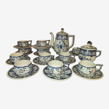 Henriot Quimper earthenware coffee set with floral decoration and elegant blue