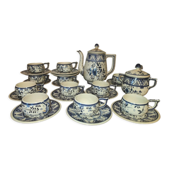 Henriot Quimper earthenware coffee set with floral decoration and elegant blue