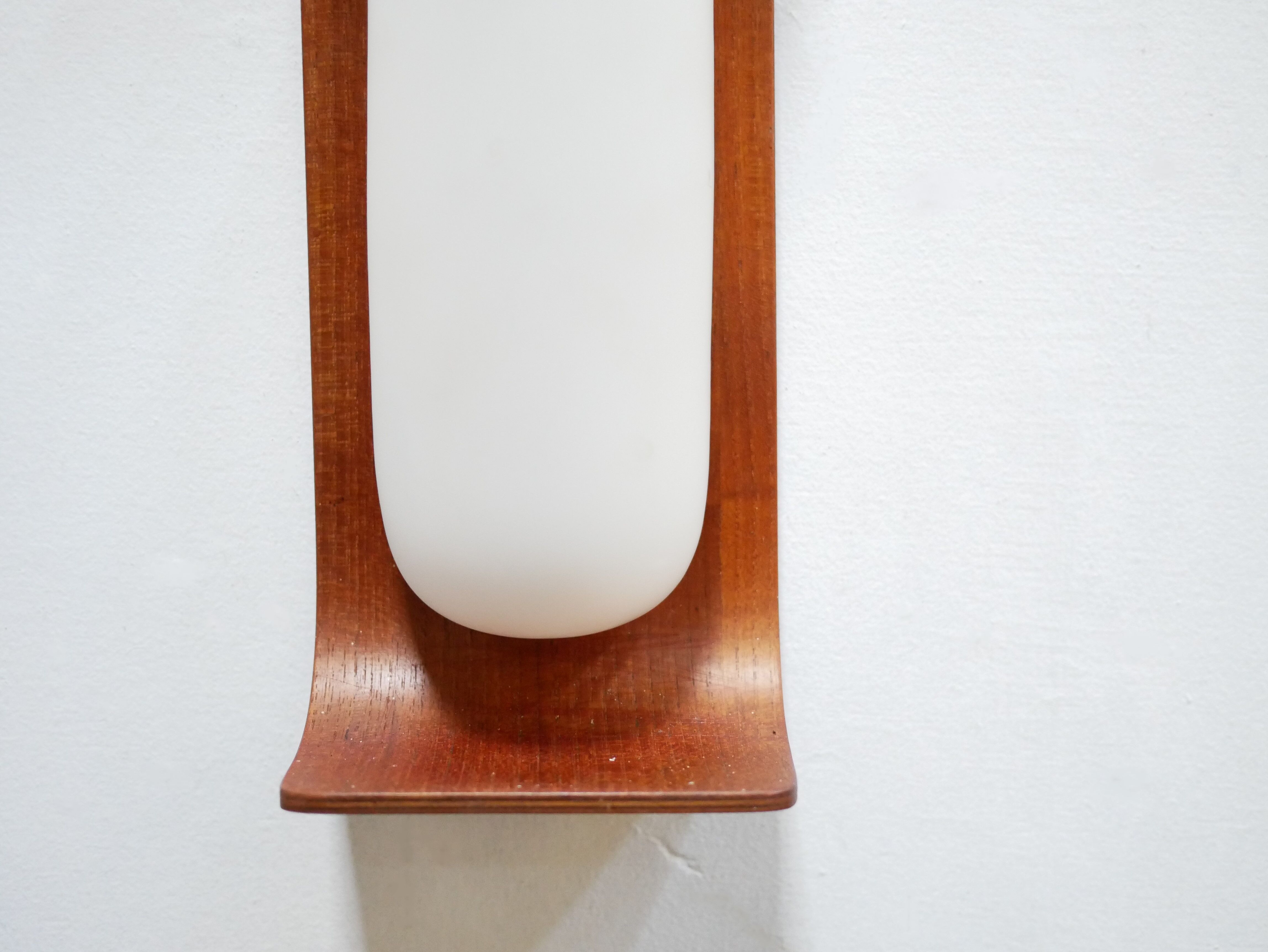 Pair of teak and opaline wall lamps by Goffredo Reggiani