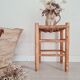 Old stool in wood and straw brutalist look