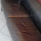 Black leather two-seater sofa