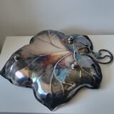 Old empty cut pocket in silver metal art nouveau in the shape of a sheet