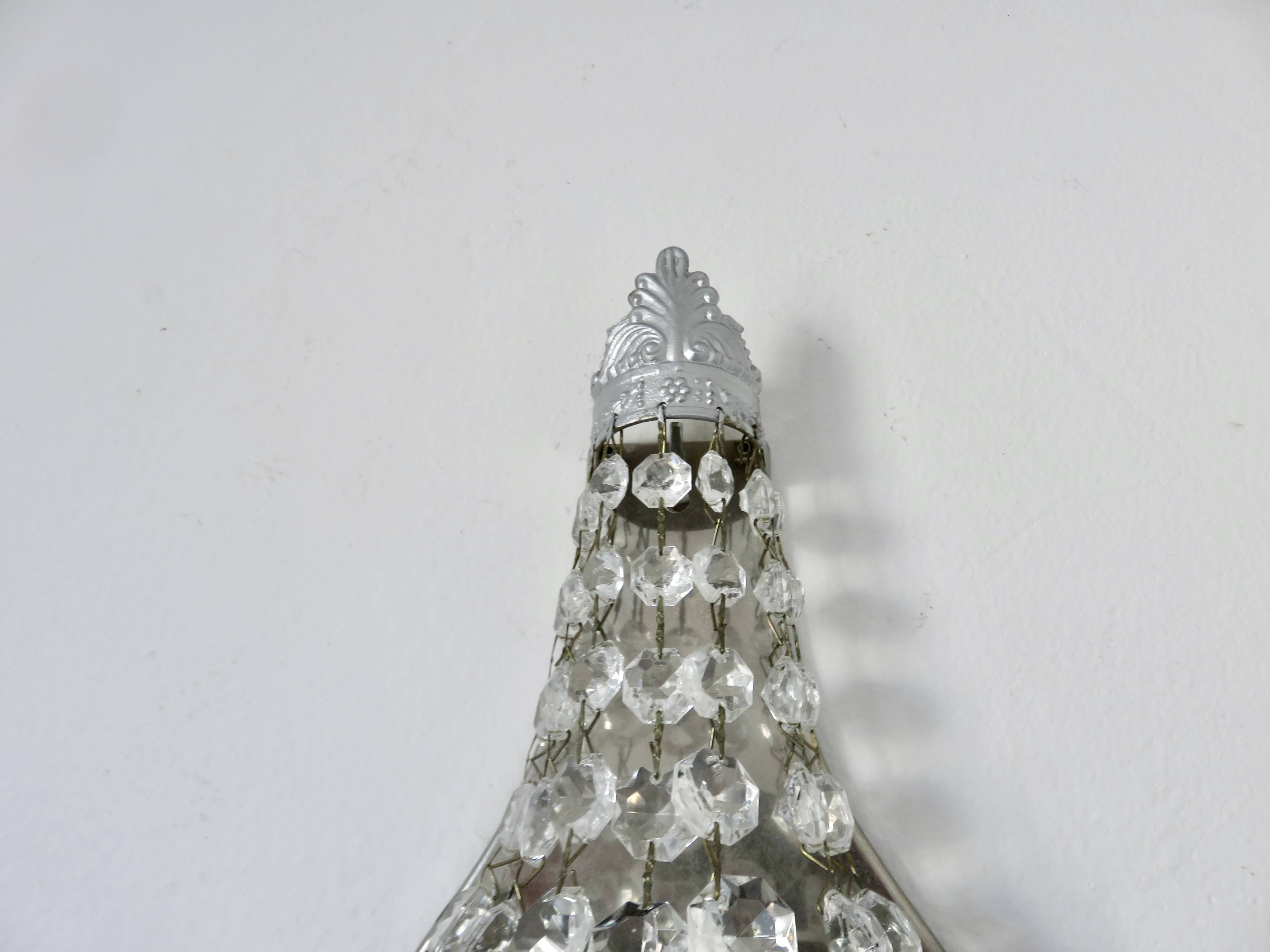 Pair of silver-plated balloon wall lights with pendants, circa 1970.