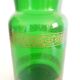 Apothecary jar in vintage green and gold glass