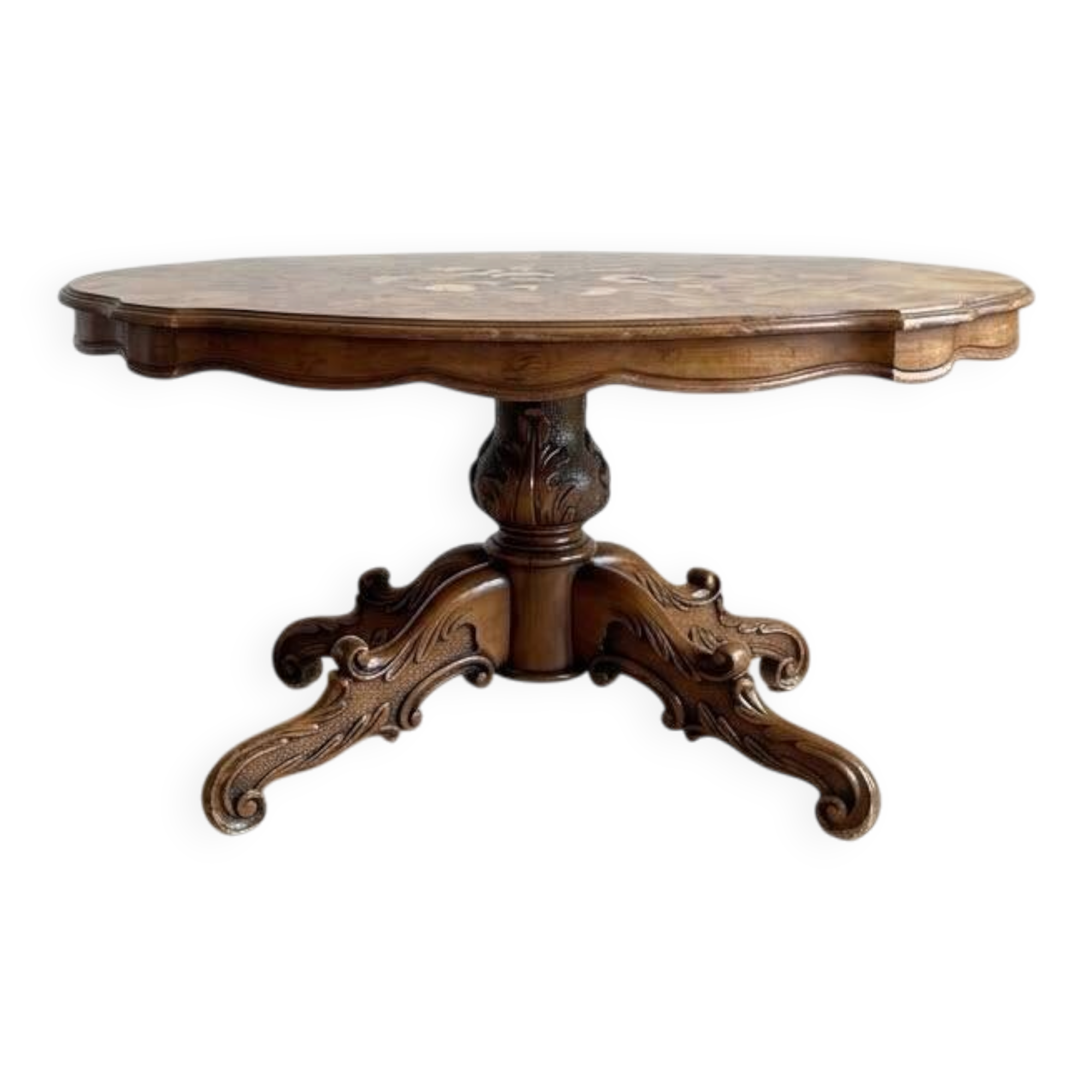 Oval coffee table in walnut burl wood.