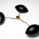Sculptural wall lamp in brass and black metal 60 's