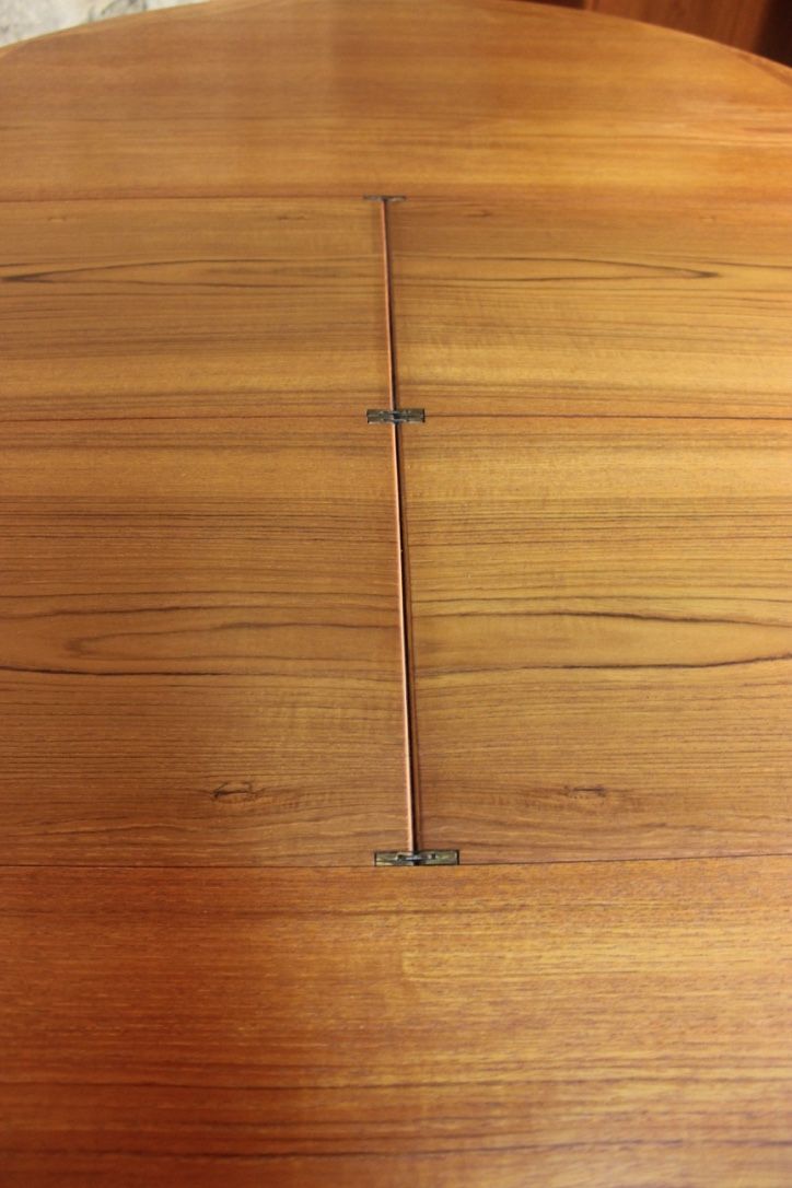 Scandinavian vintage teak dining table with 2 extension cords hidden by Svend Aage Madsen for Knudsen - Son, Denmark