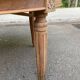 Art Deco round extendable dining table stripped in solid walnut from the 1920s.