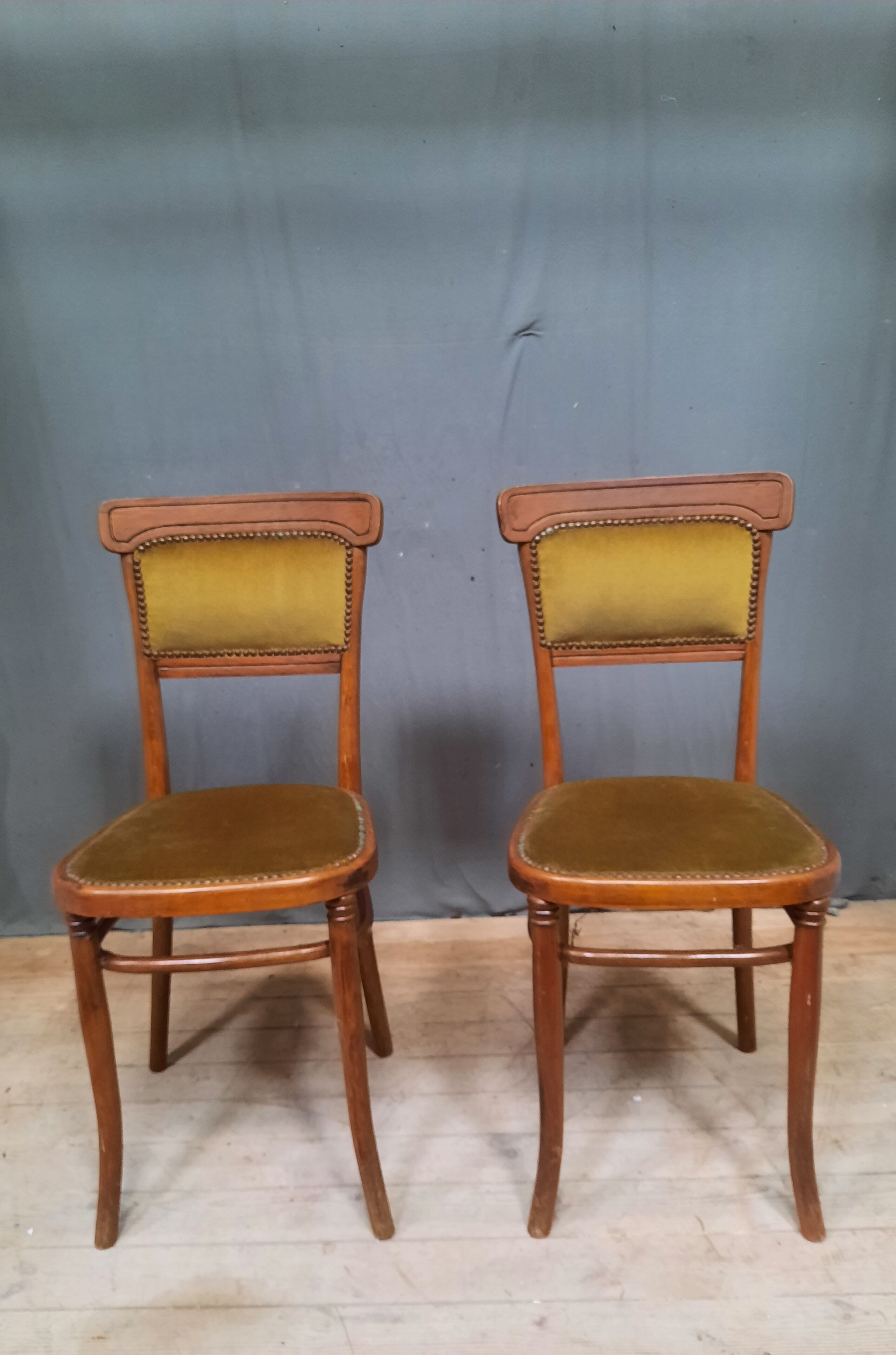 Pair of armchair and chair in curved wood