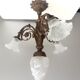 Art nouveau chandelier in bronze and pressed glass 1920