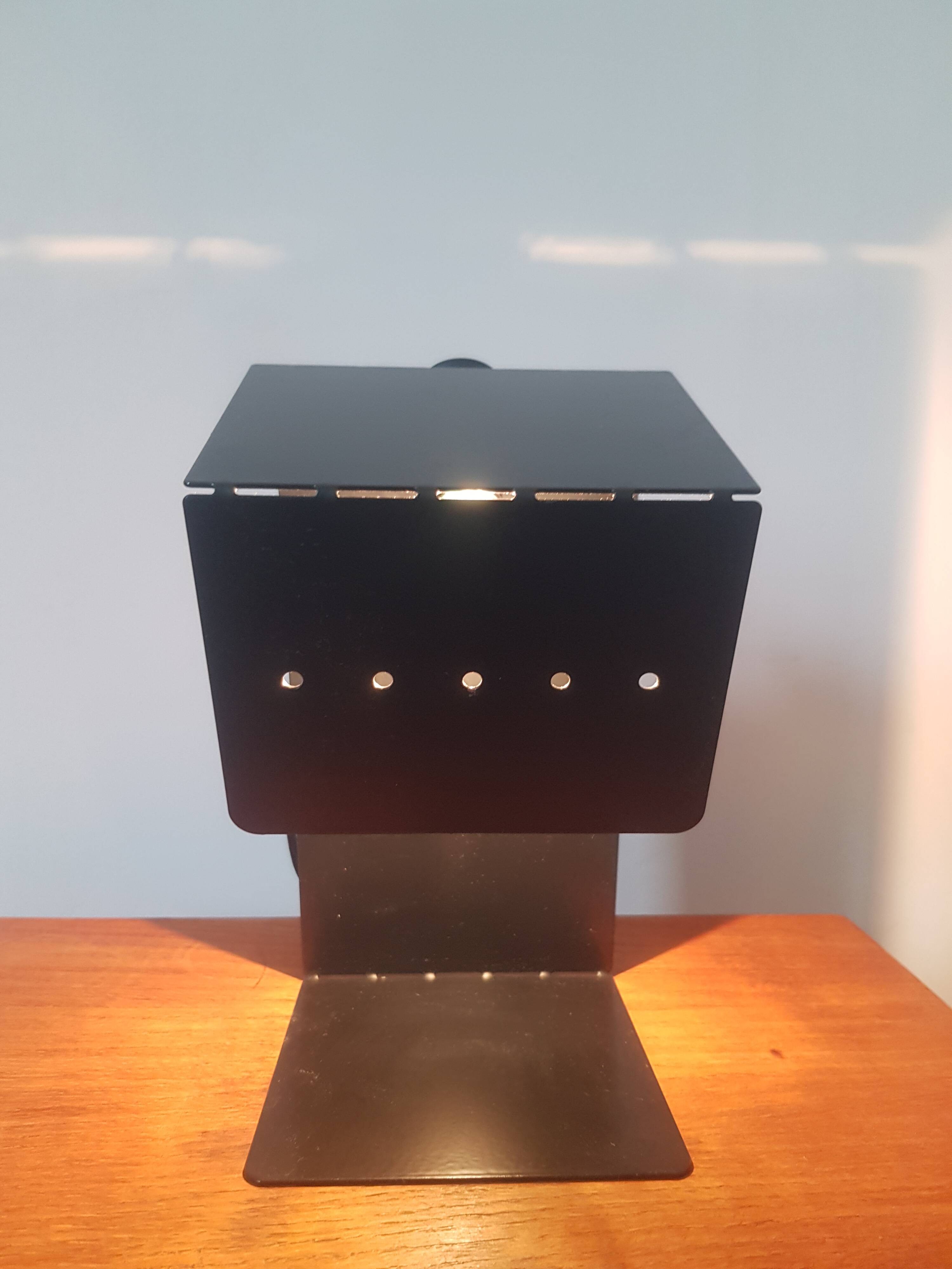 Folded sheet metal lamp