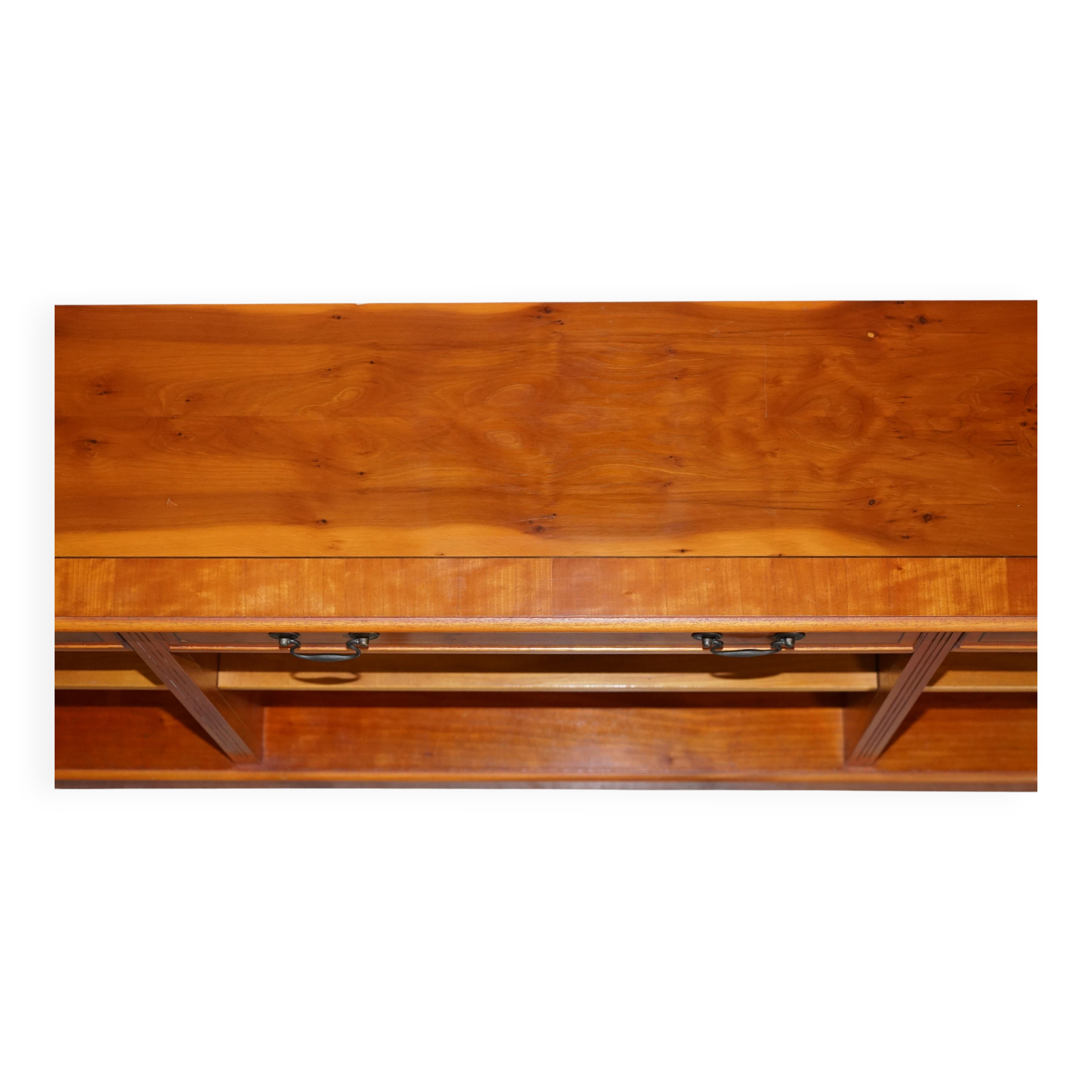 Vintage yew wood library/buffet with three drawers.