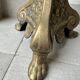 Gilded bronze candlestick with cherub trio decoration