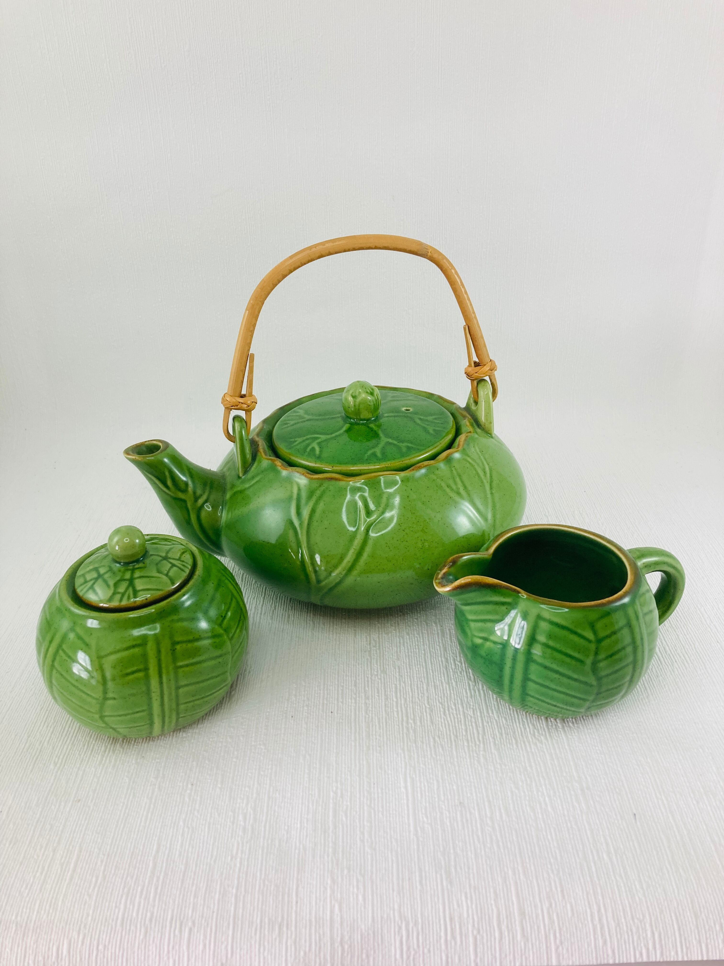 Green earthenware tea set with cabbage pattern, vintage 1970s.