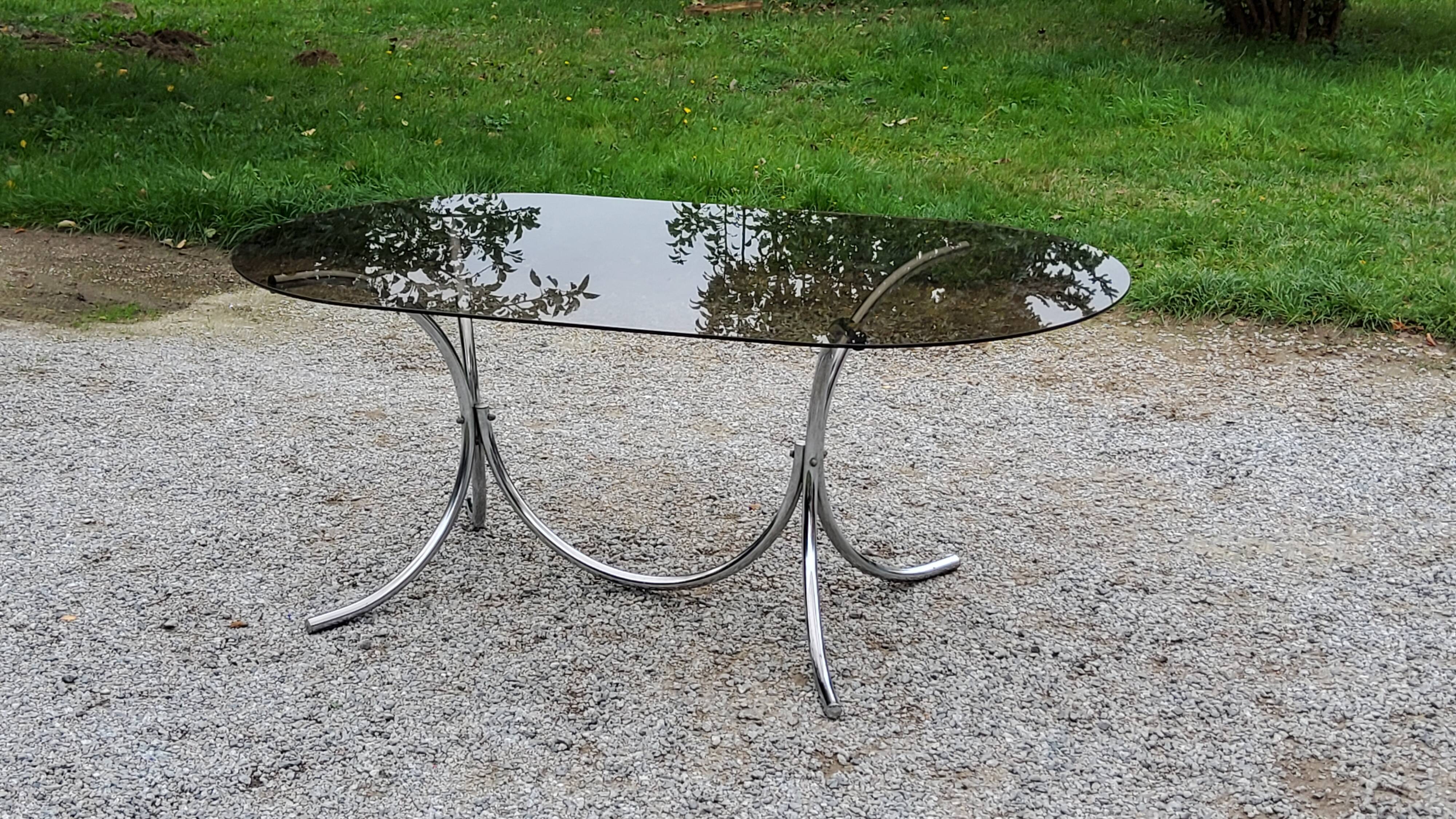 Dining table from the 70s top smoked glass base chrome