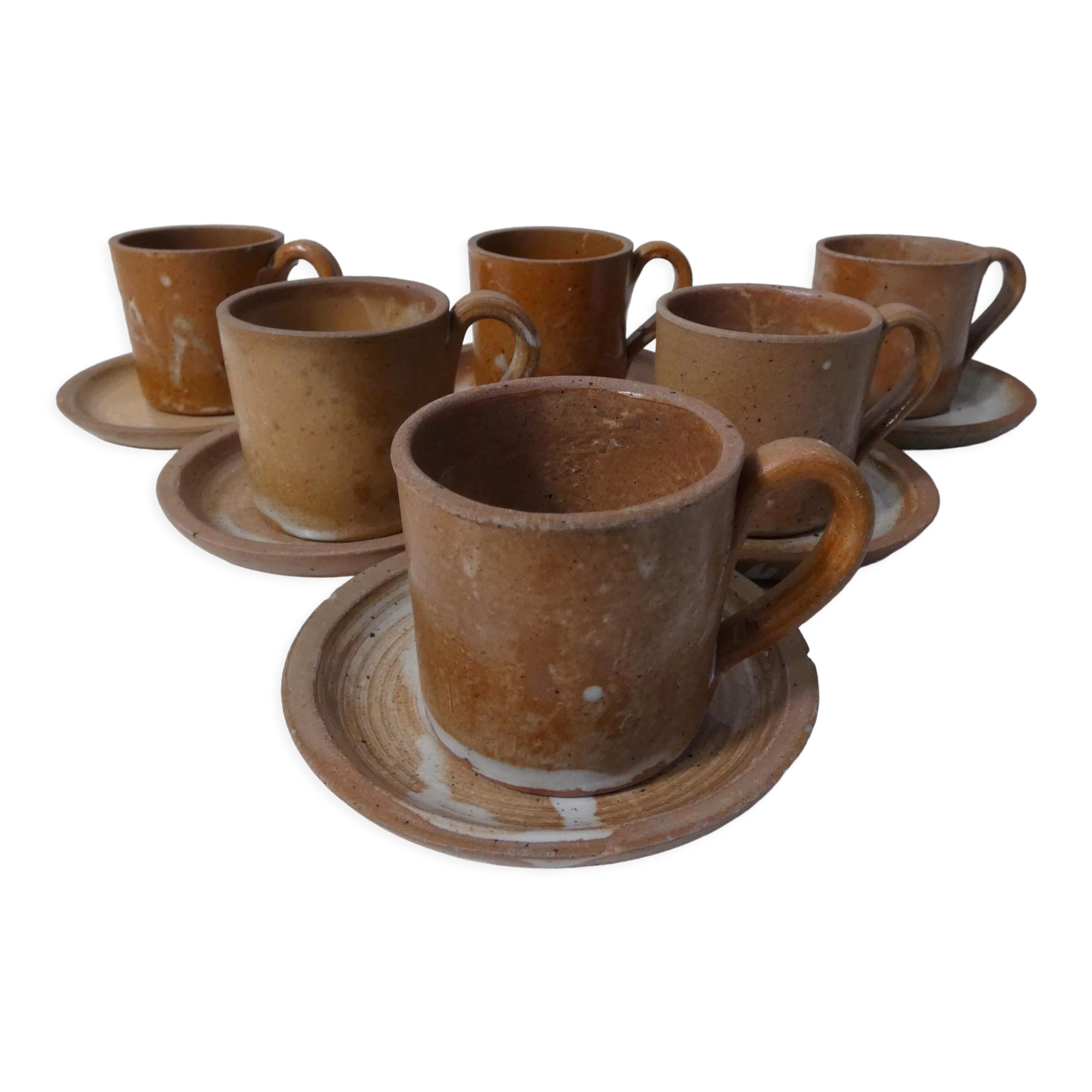 6 stoneware cups and saucers