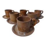6 stoneware cups and saucers