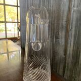 Transparent crystal pitcher, mid-century Hungarian, conical silhouette, sculptural handle and cut decoration.