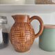 Caramel brown pitcher in glazed ceramic with barbotine finish from the 60s