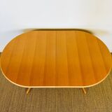 Vintage oval dining room table with extension