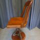 Swivel American chair in walnut and cast iron
