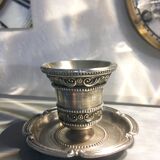 Chiseled silver metal candle holder