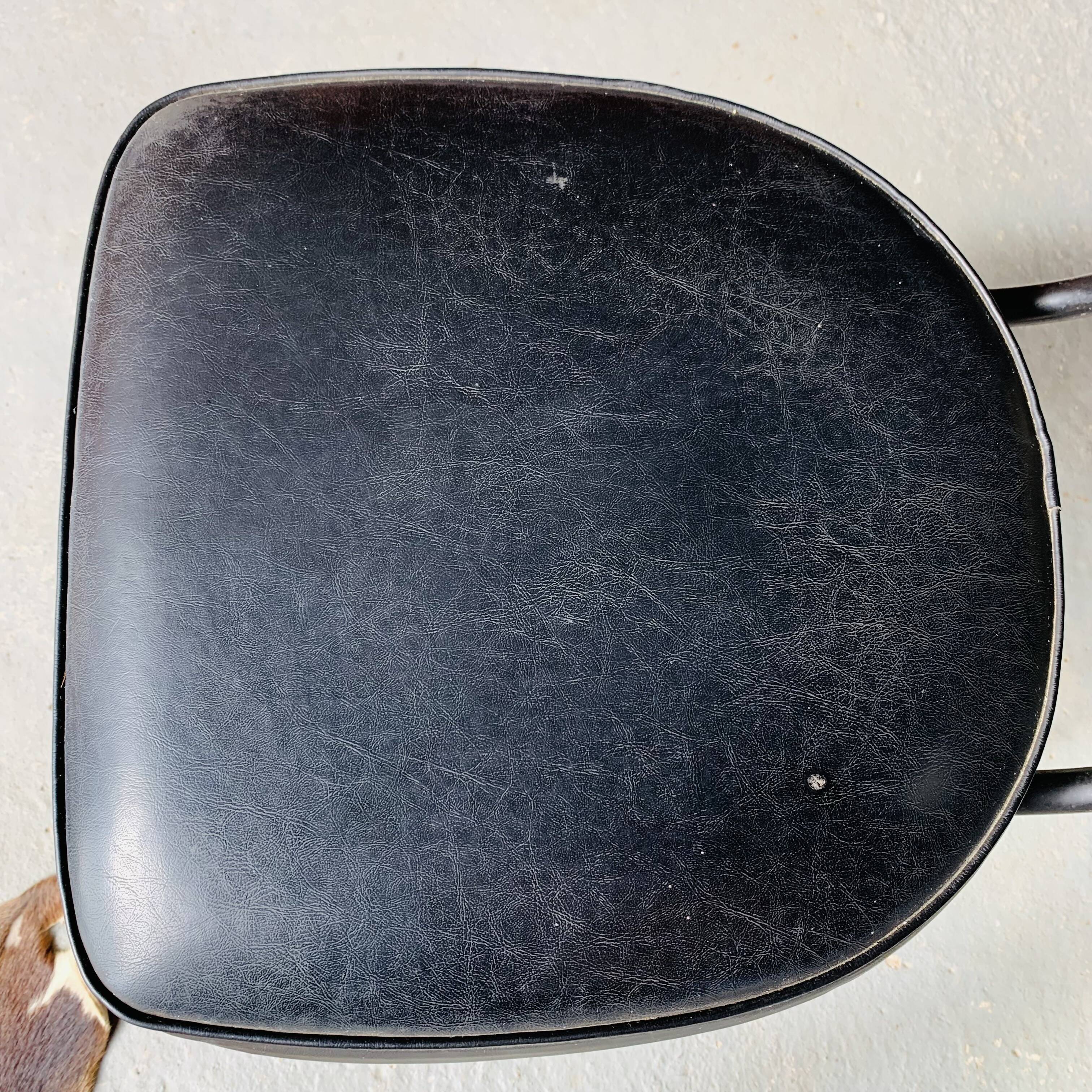 Pair of vintage black skai chairs