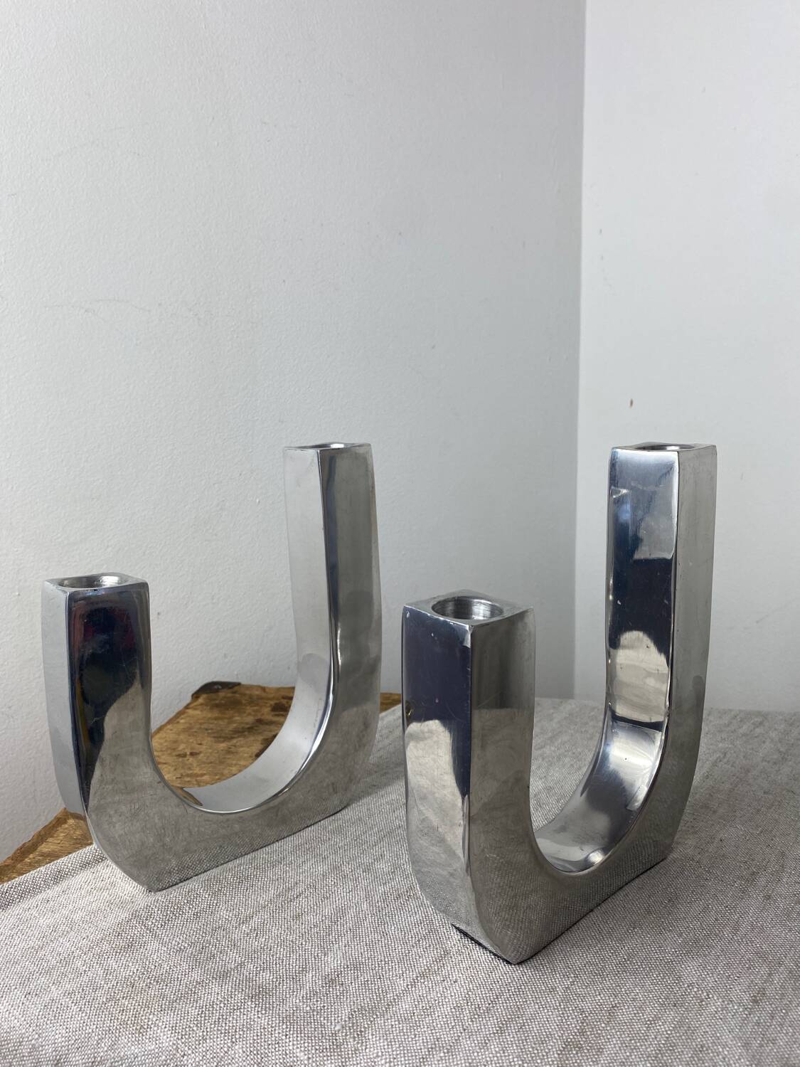 Designer candle holders in brushed aluminum