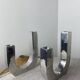 Designer candle holders in brushed aluminum