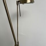 Golden metal floor lamp with reading light