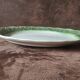Oval ceramic dish in slip style