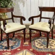 Set of 2 armchairs and 6 English mahogany chairs from the 1950s.