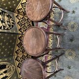 3 curved wooden bar stools