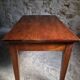 Old French table in cherry wood with bistro chair, circa 1900–1930.