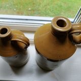 Duo of stoneware decanter bottles