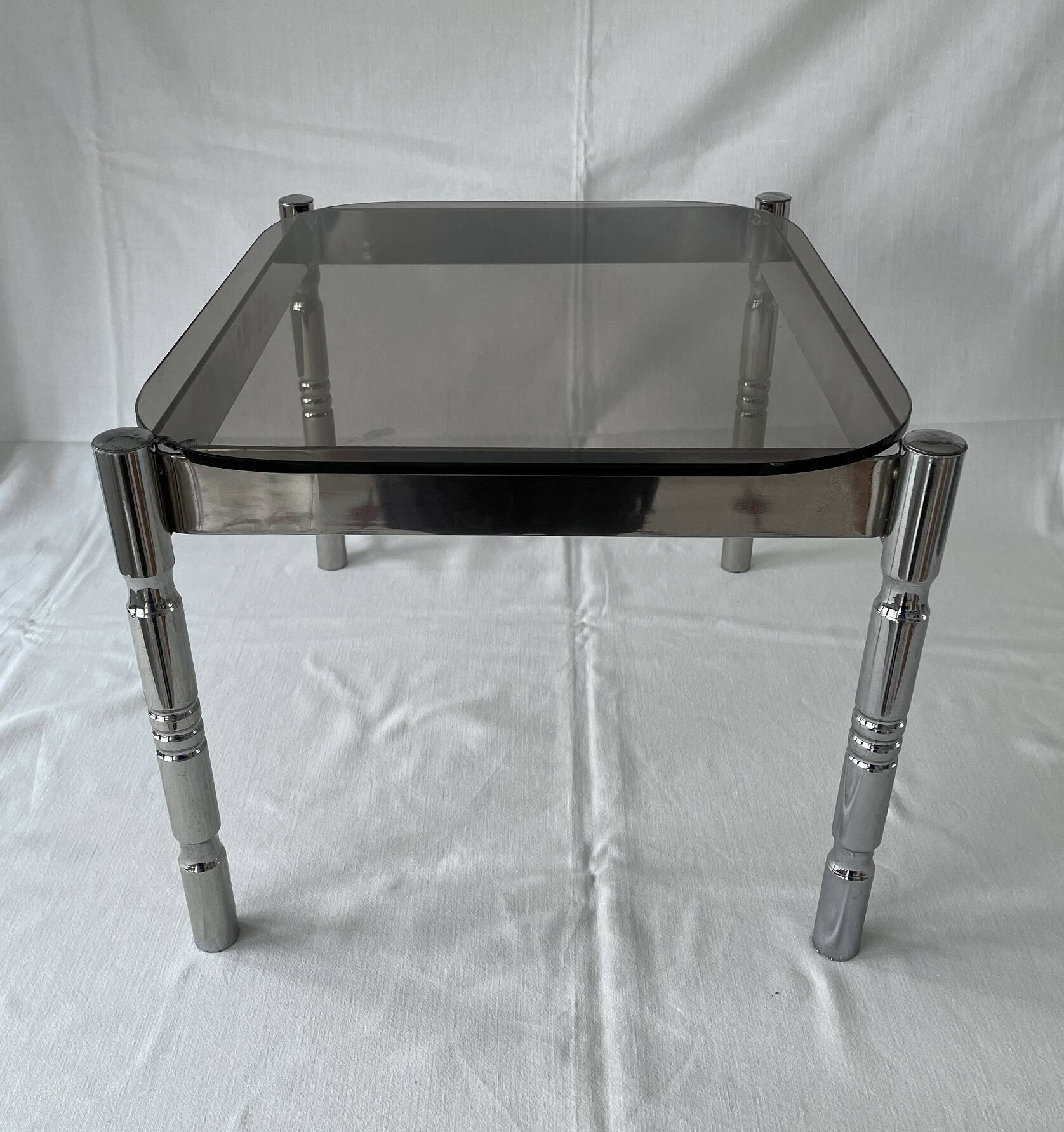 Vintage coffee table in chrome metal and smoked glass