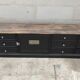 Low TV cabinet with black patina, twelve drawers and one door