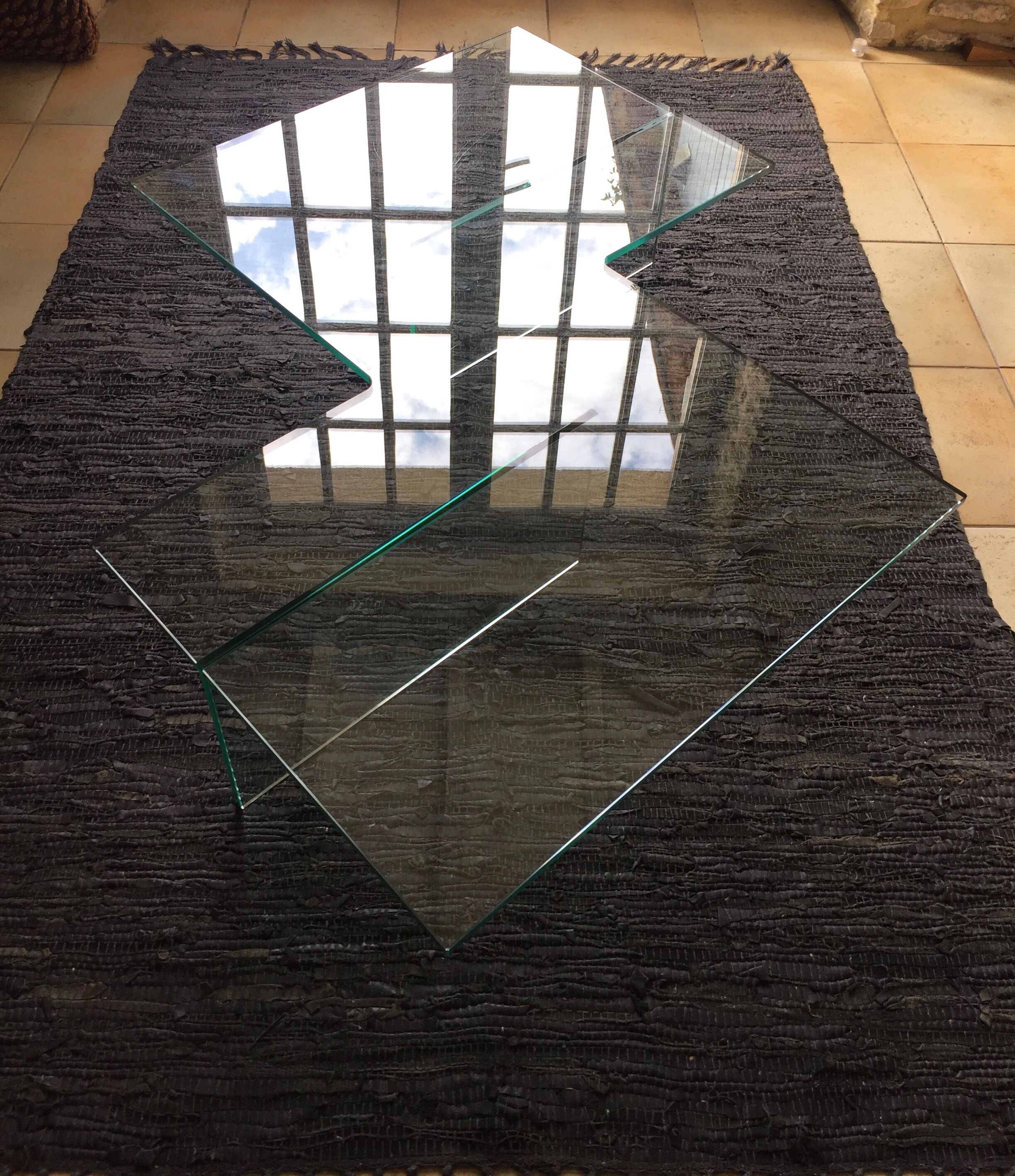 All-glass free-form coffee table