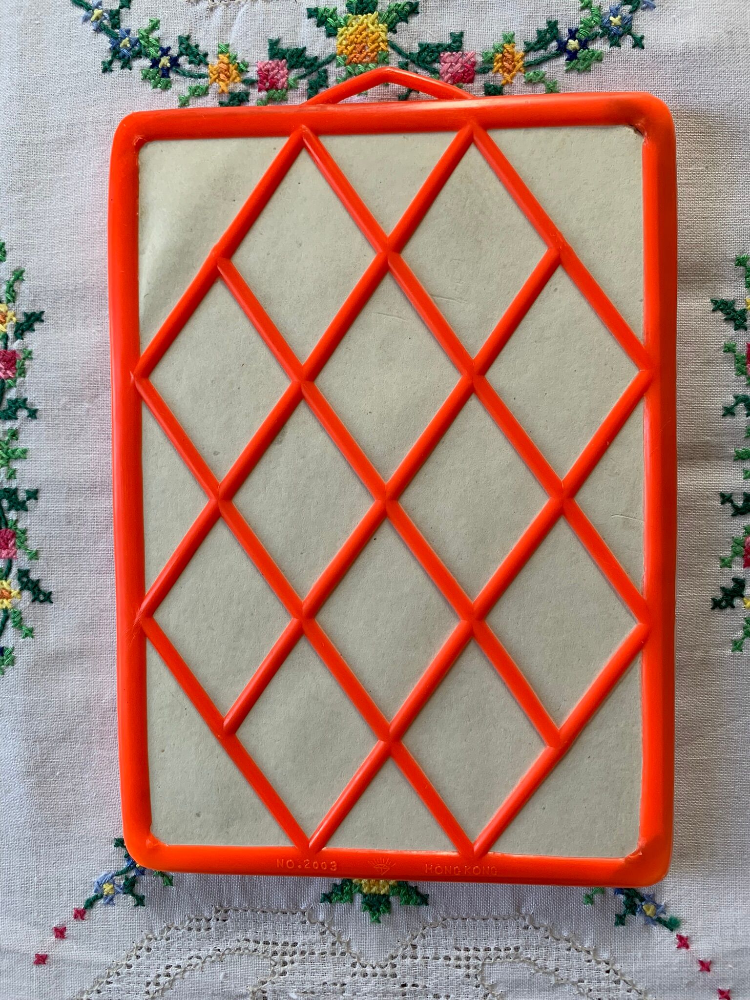 Orange plastic triptych mirror