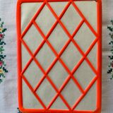 Orange plastic triptych mirror